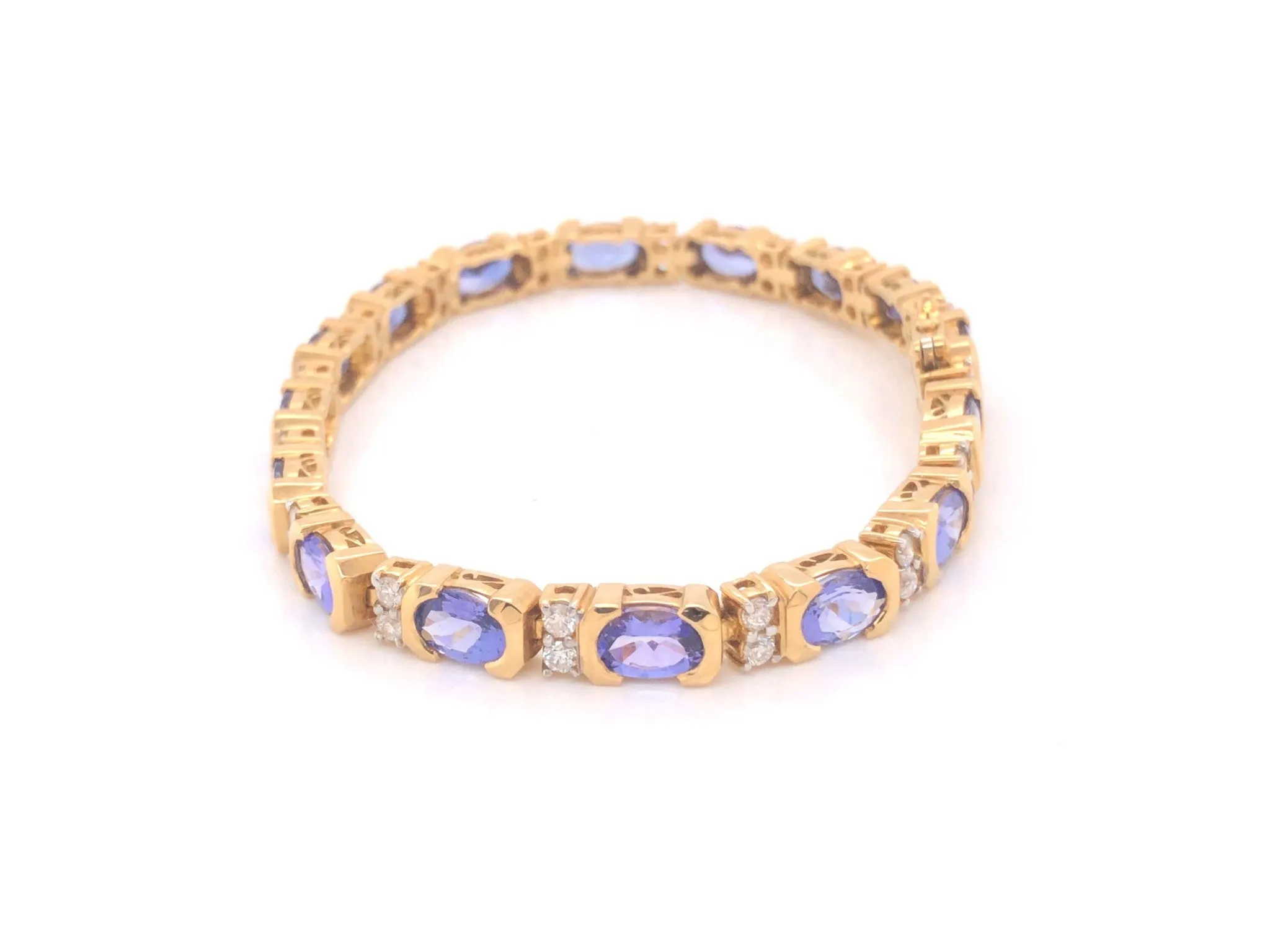 11 Carat Tanzanite and Diamond Link Bracelet 18k Yellow Gold