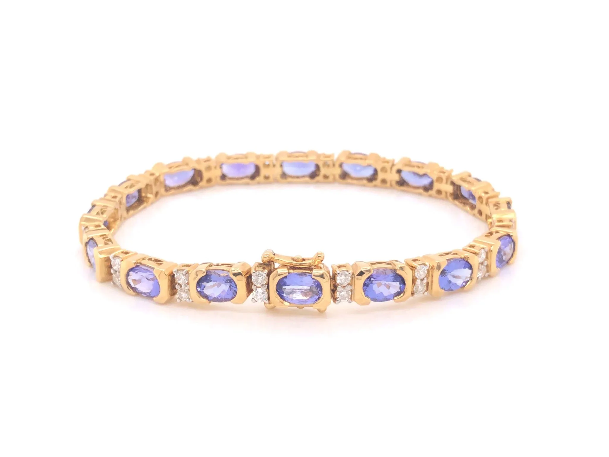 11 Carat Tanzanite and Diamond Link Bracelet 18k Yellow Gold