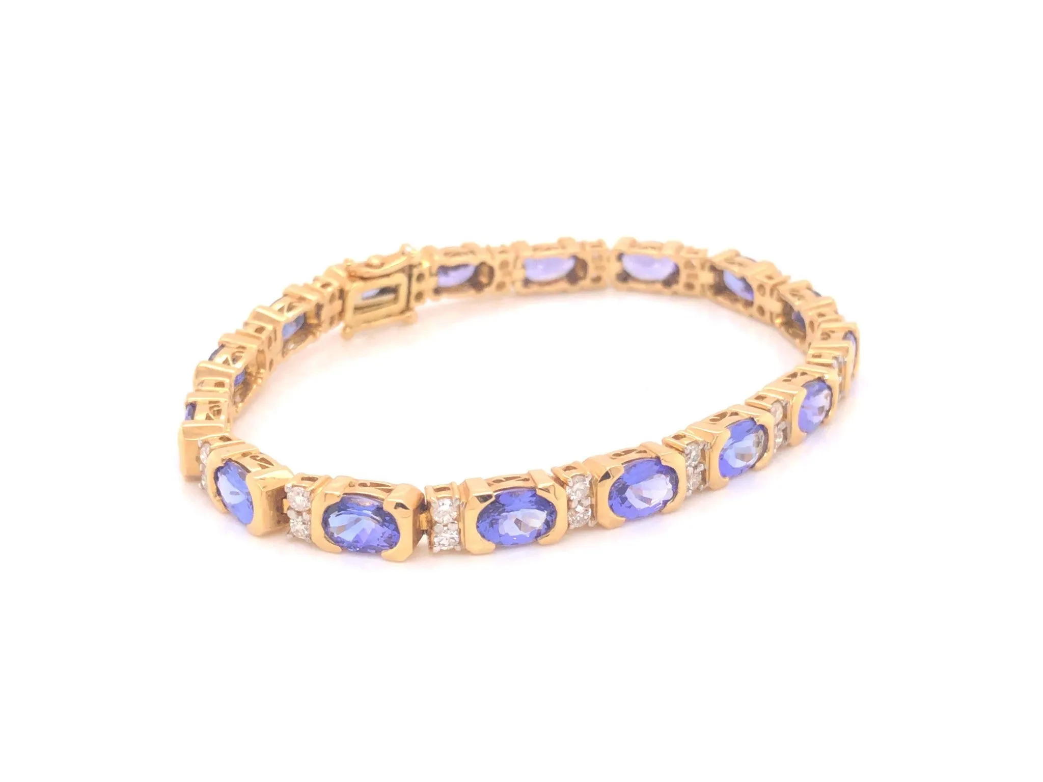 11 Carat Tanzanite and Diamond Link Bracelet 18k Yellow Gold