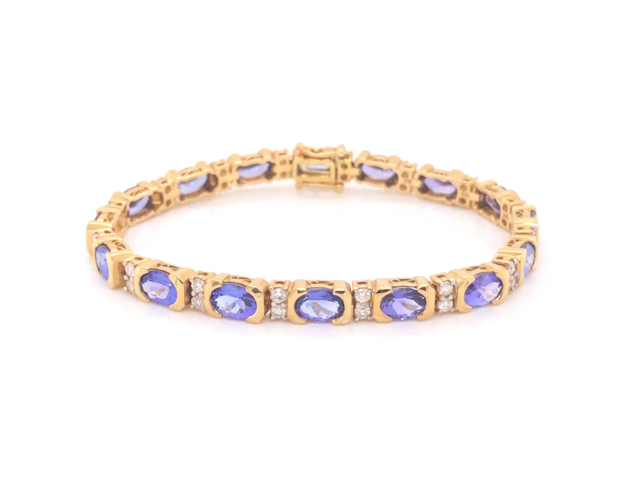 11 Carat Tanzanite and Diamond Link Bracelet 18k Yellow Gold