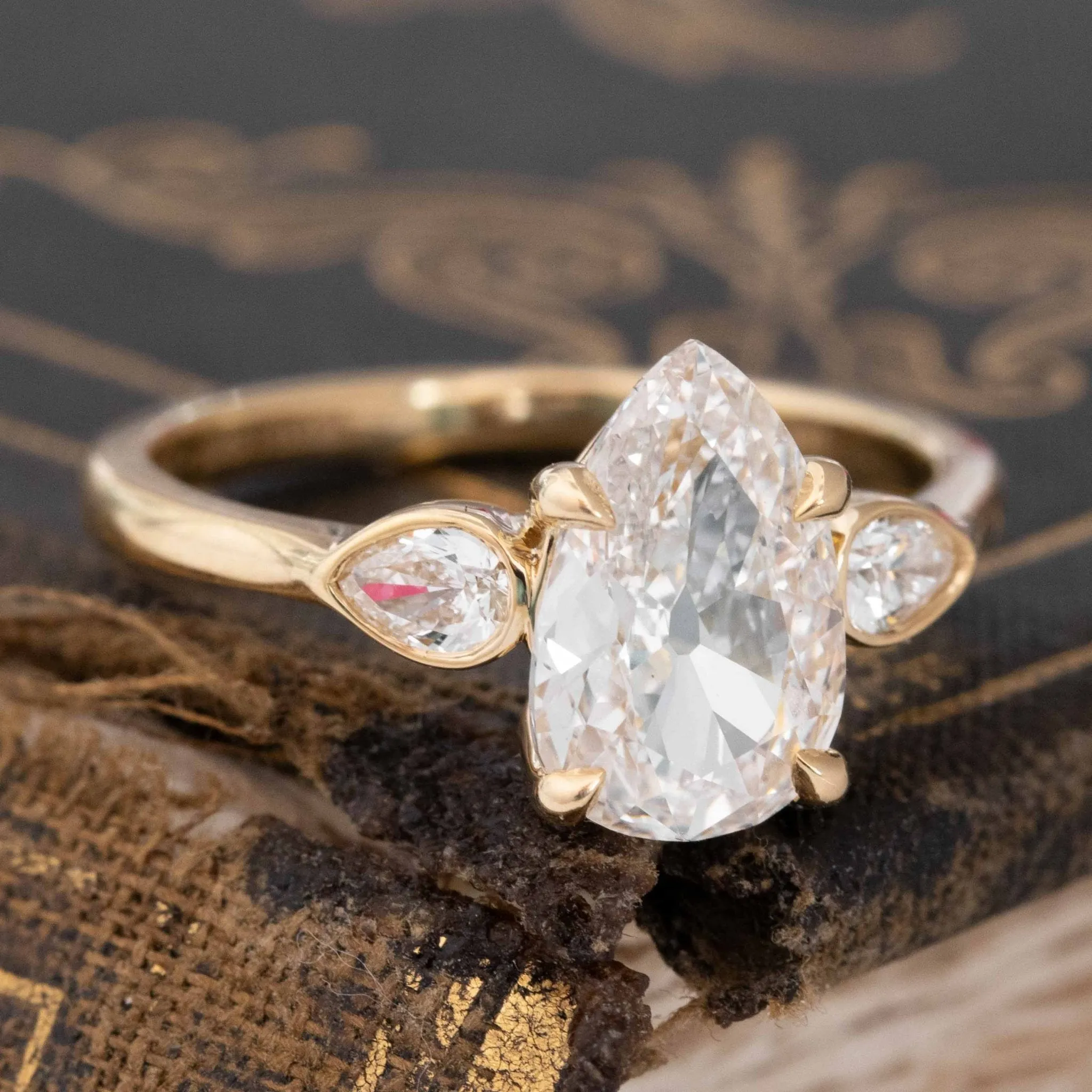1.71ctw Pear Cut Diamond Trilogy Ring, GIA G VS2