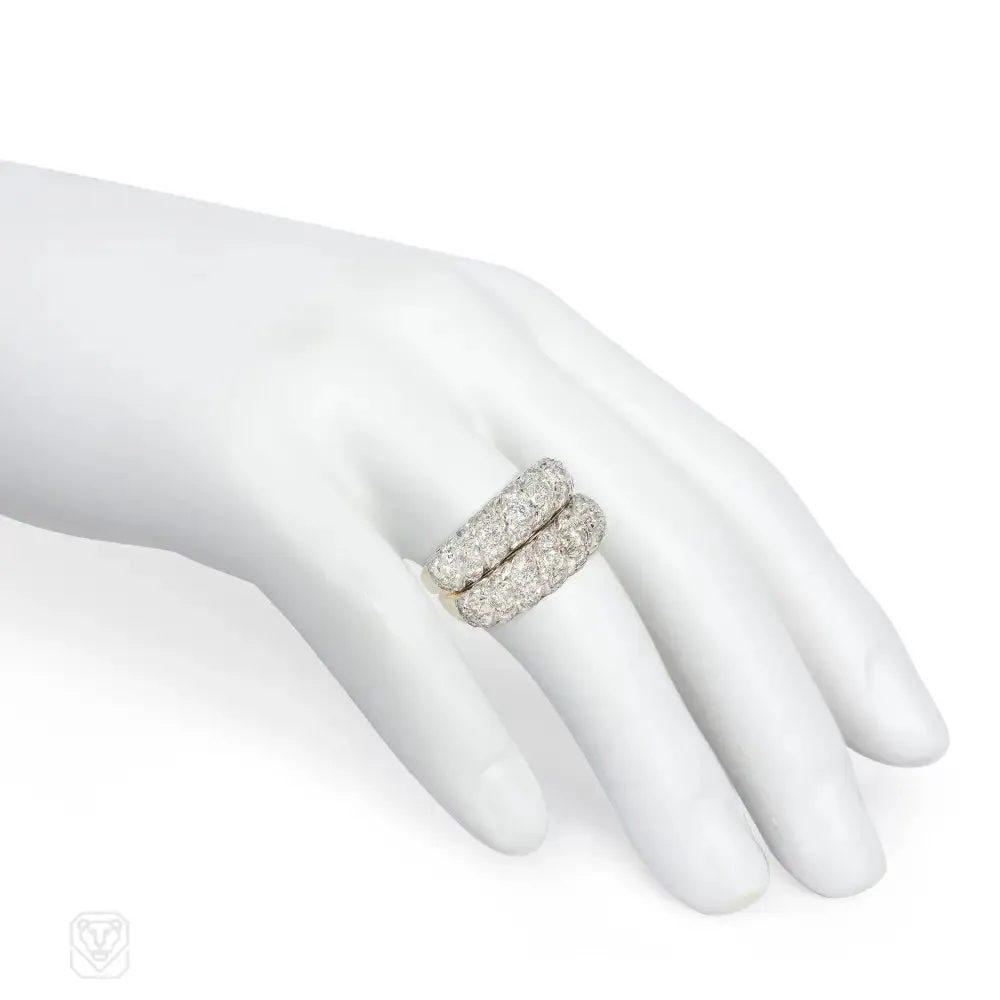 A pair of French gold, platinum, and diamond twist rings for Neiman Marcus