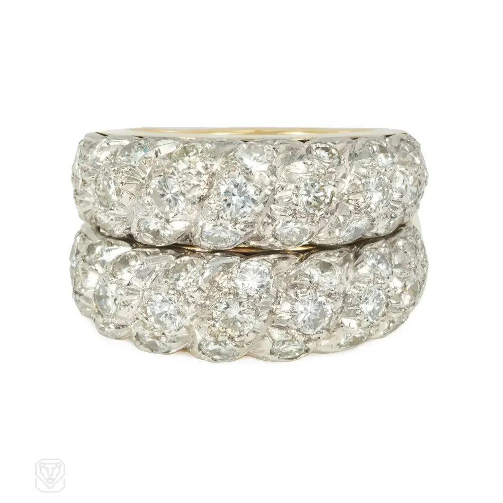 A pair of French gold, platinum, and diamond twist rings for Neiman Marcus