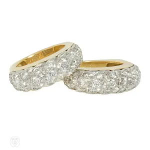 A pair of French gold, platinum, and diamond twist rings for Neiman Marcus