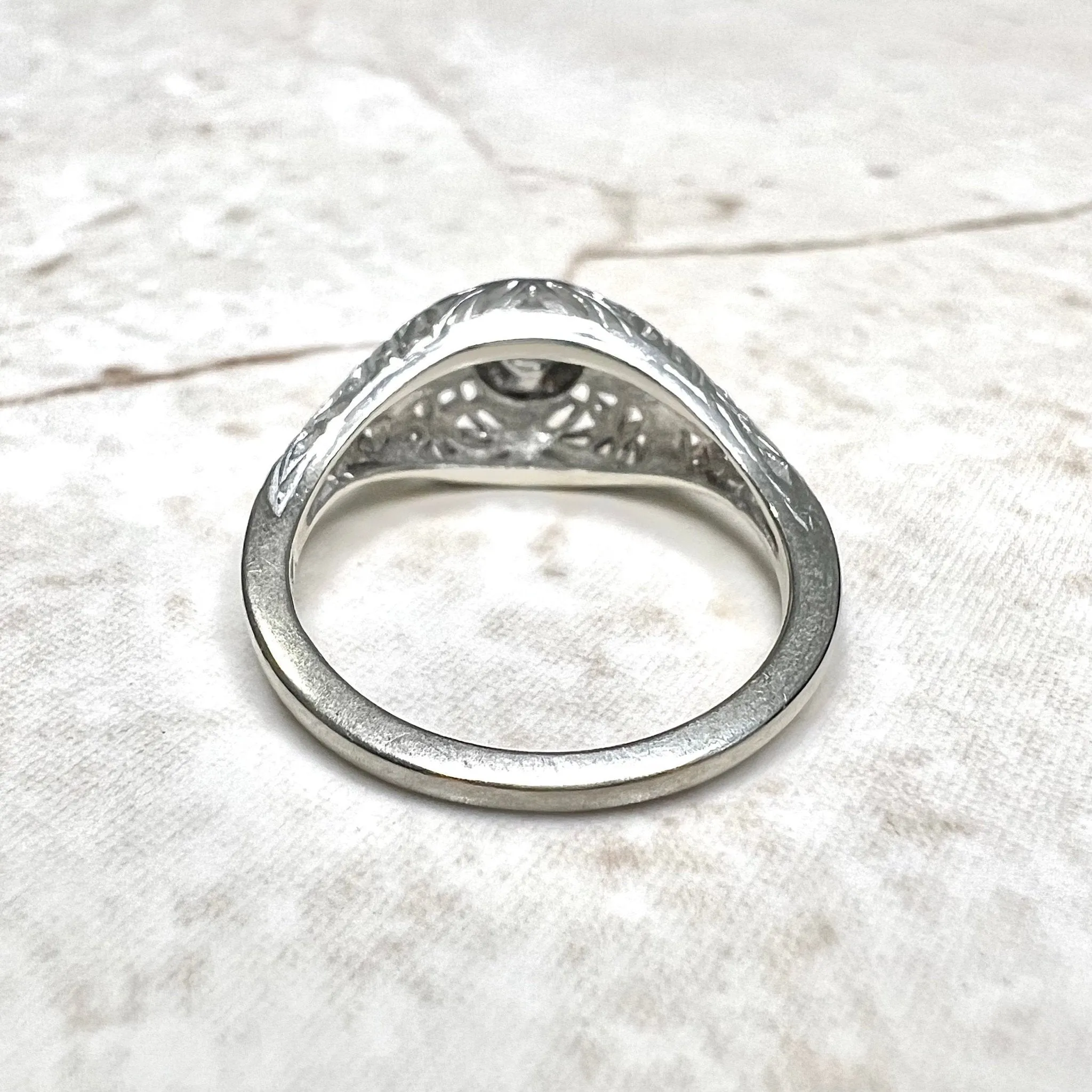 Antique Edwardian 14 Karat White Gold Filigree 0.15 Carat Diamond Engagement Ring