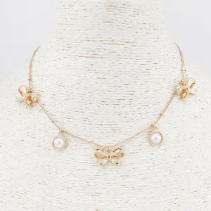Gold Pearl Bow Charm Necklace