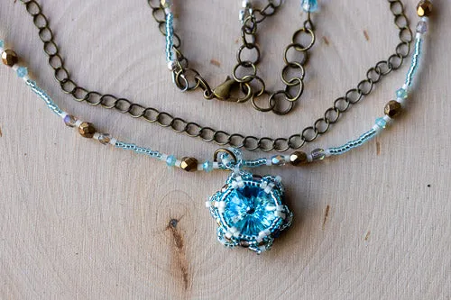 Handwoven Lotus Flower Necklace | Aqua Blue Crystal & Brass
