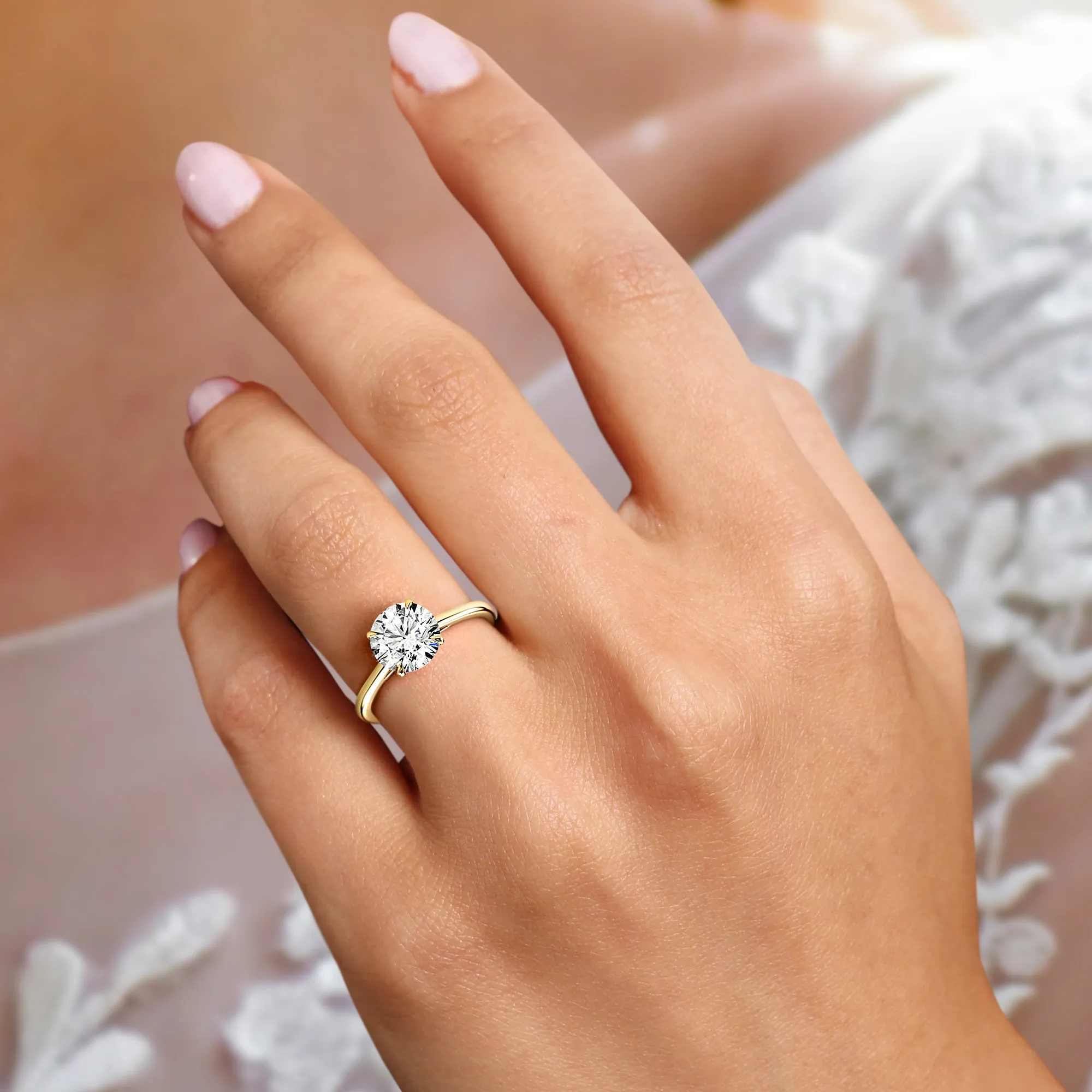 JULLIET ROUND CUT CATHEDRAL SOLITAIRE RING