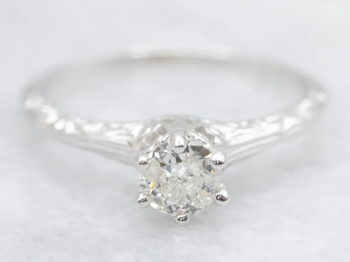 Ornate Diamond Solitaire Engagement Ring with Etched Shoulders