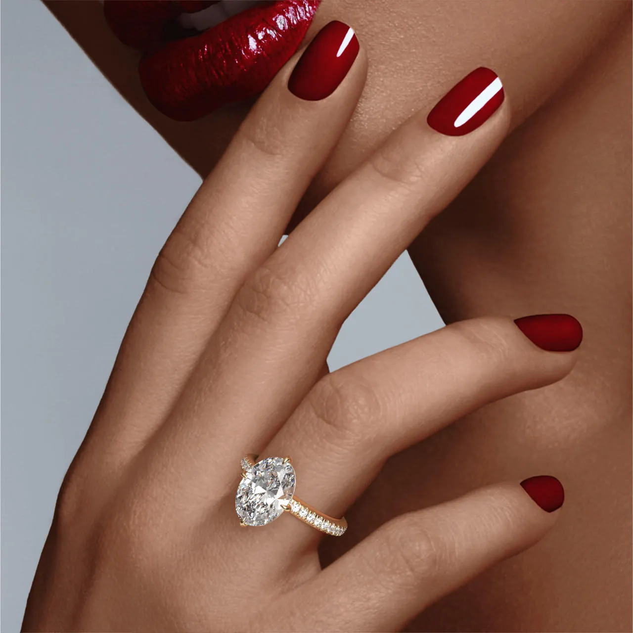 OVAL CUT DIAMOND ENGAGEMENT RING WITH A COMPASS 4 PRONG THREE PHASES PAVE SETTING IN 18K YELLOW GOLD