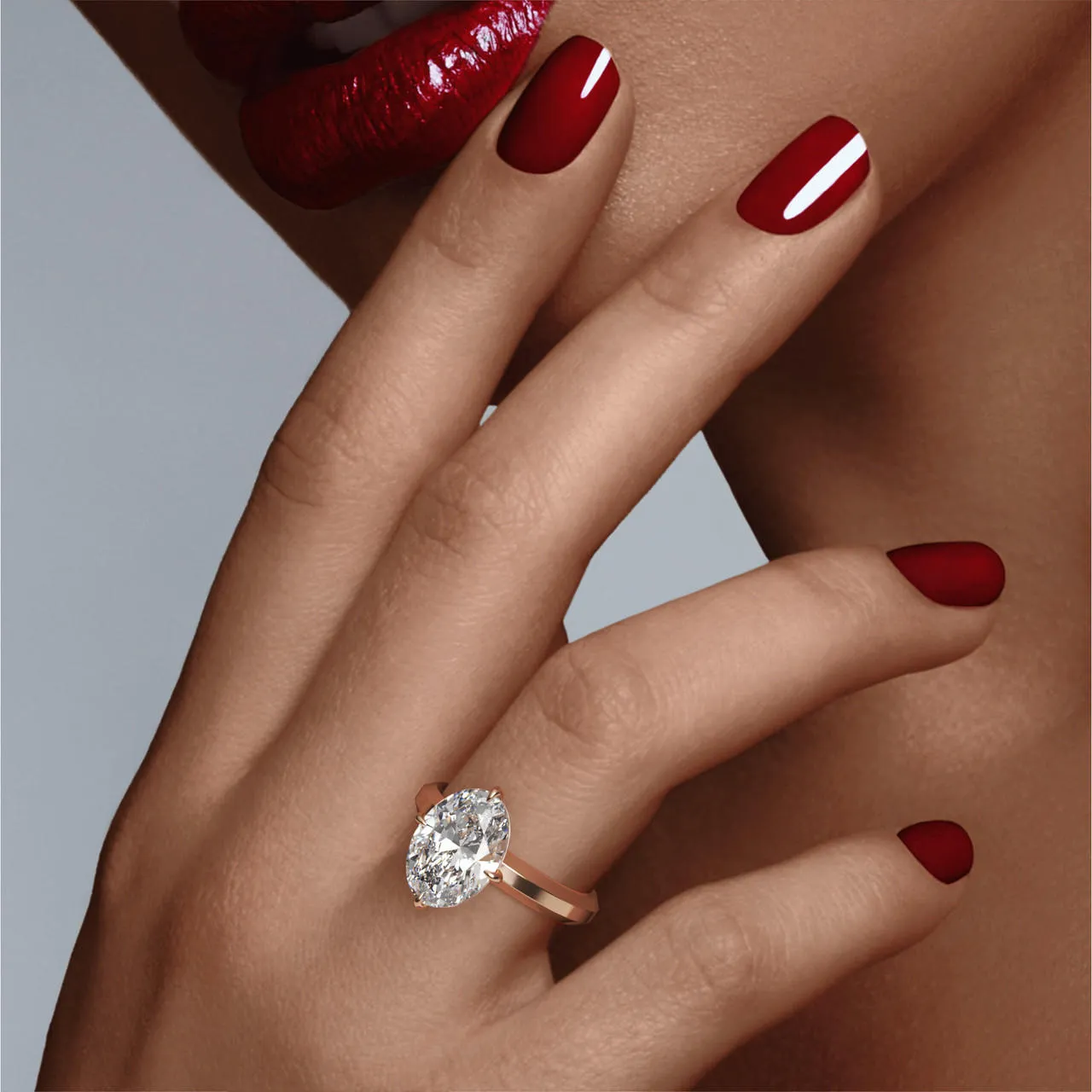 OVAL CUT DIAMOND ENGAGEMENT RING WITH A COMPASS 4 PRONG THREE PHASES SETTING IN 18K ROSE GOLD