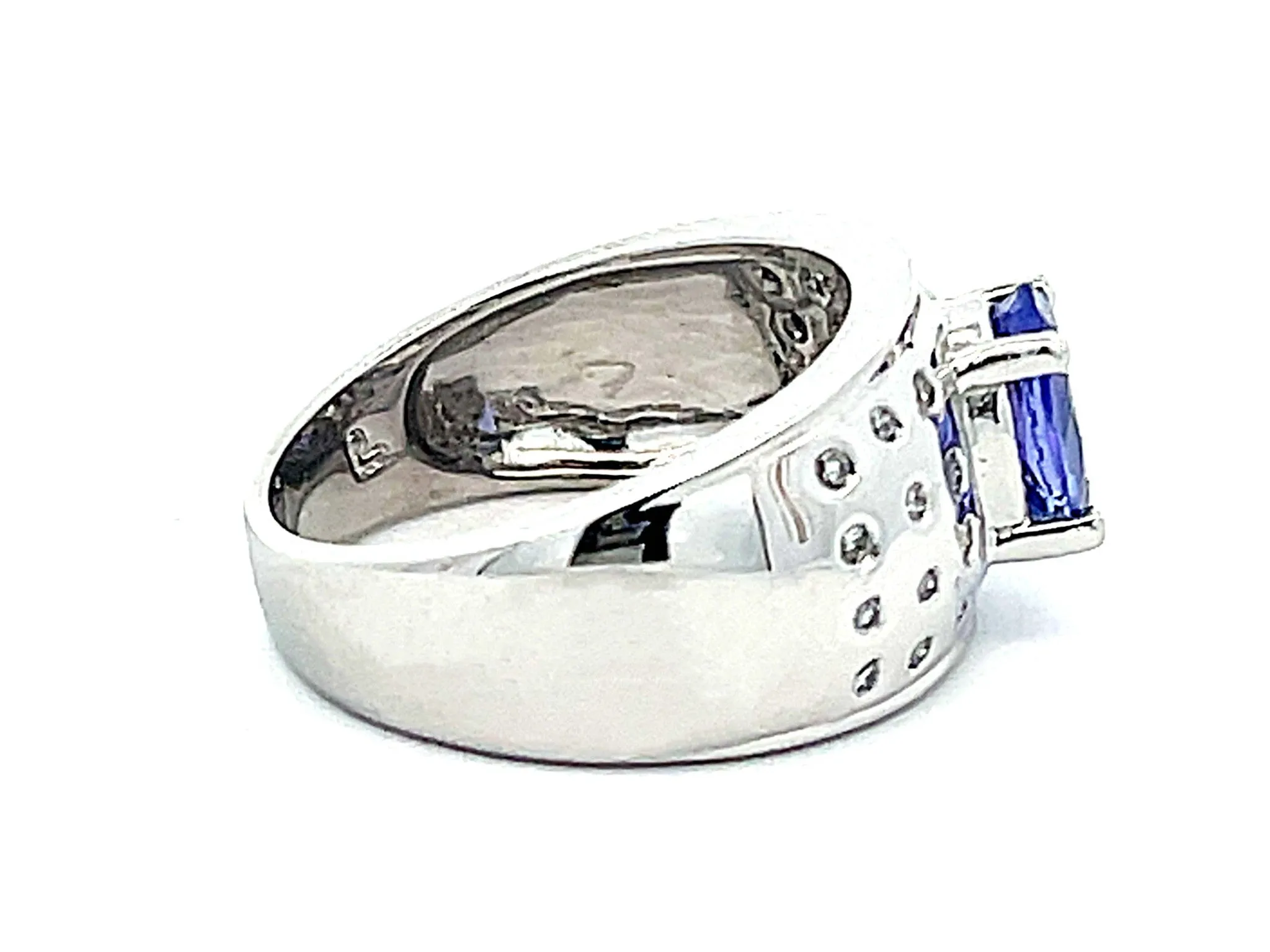 Oval Tanzanite and Diamond Studded Wide Dome Ring in Platinum