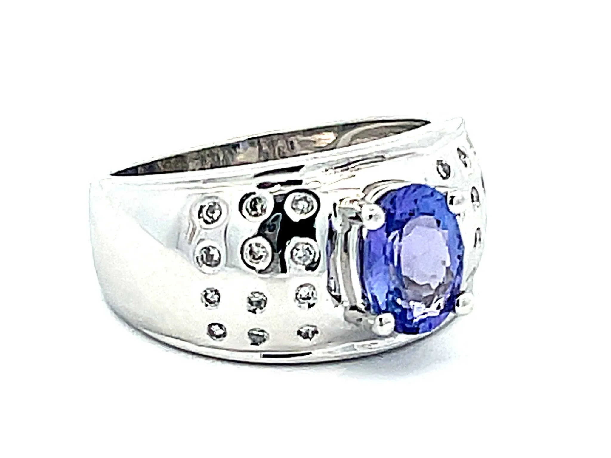 Oval Tanzanite and Diamond Studded Wide Dome Ring in Platinum