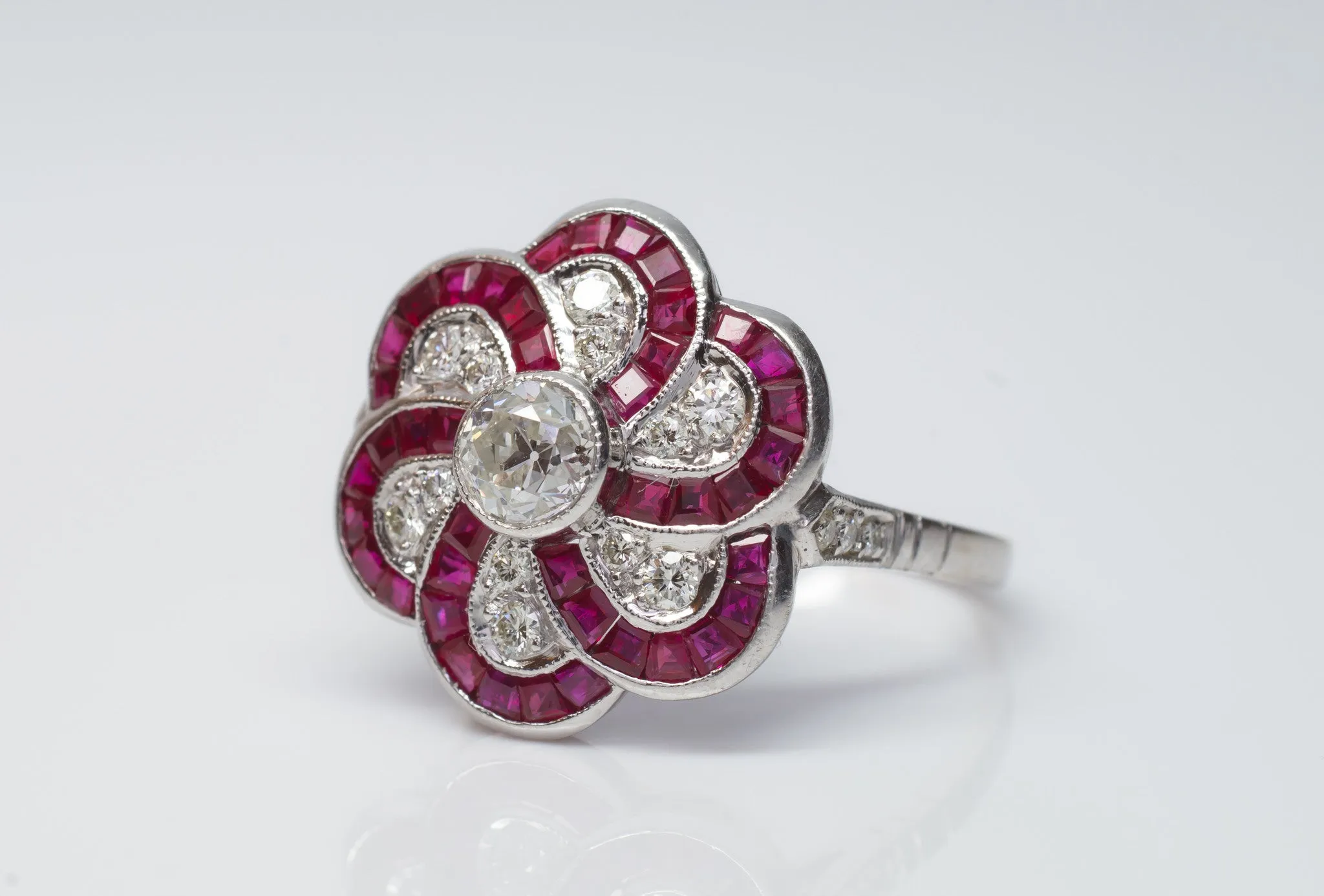 RUBY AND OLD EUROPEAN CUT DIAMOND TARGET RING