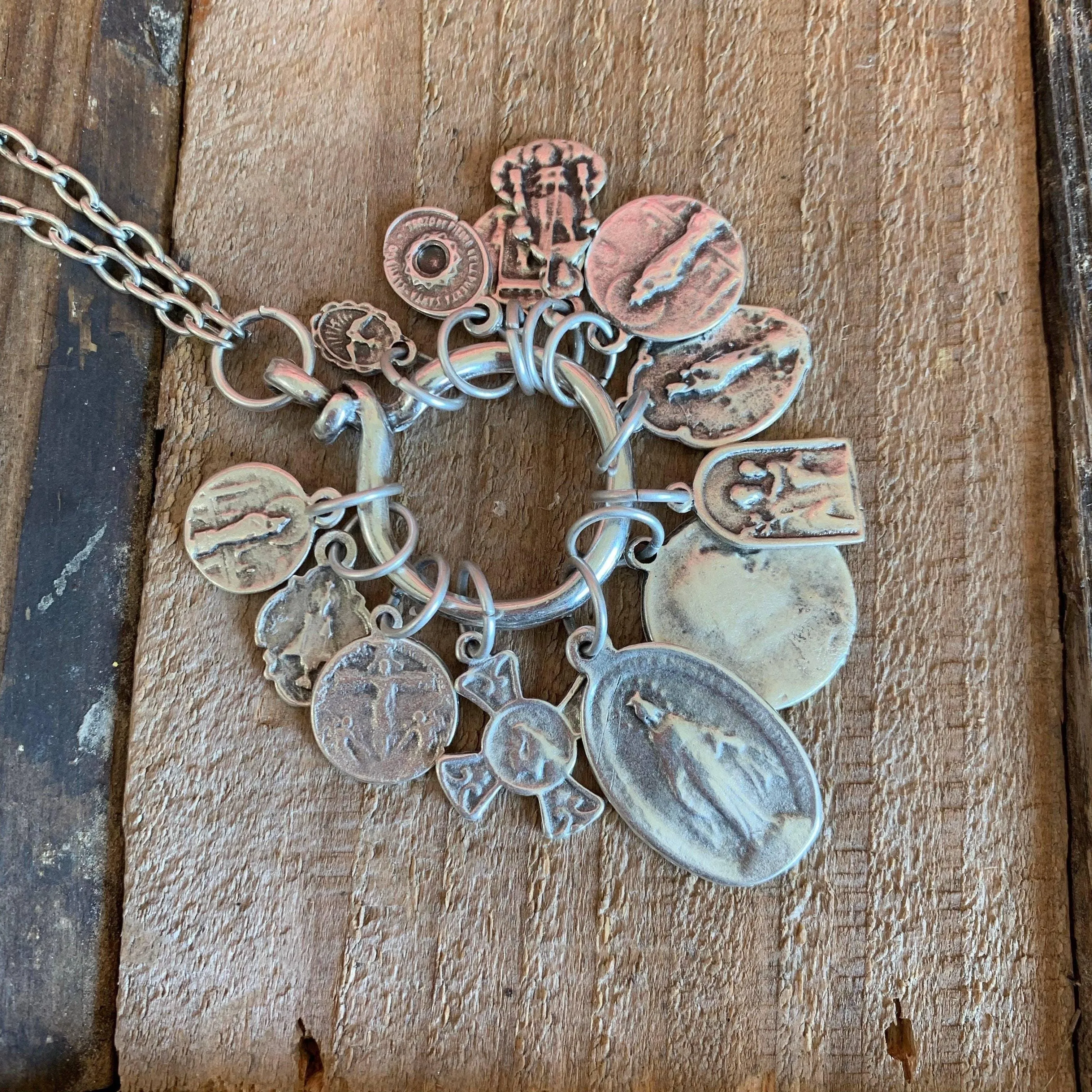 Saint Charm Necklaces: OLG