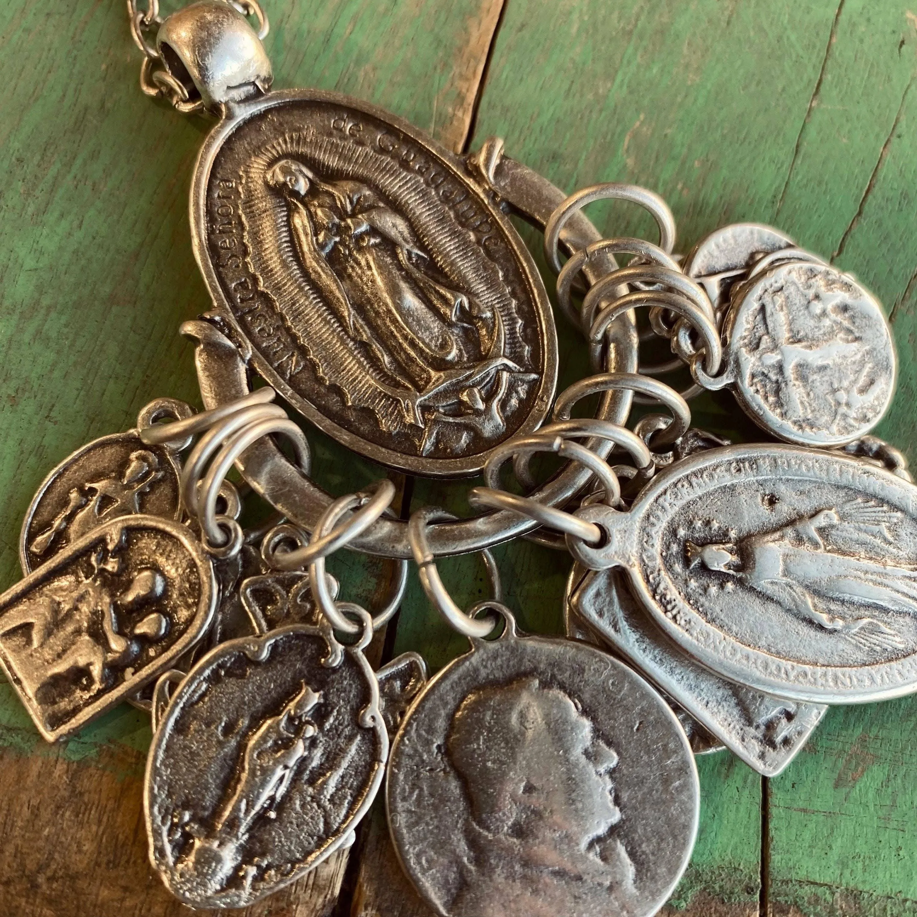 Saint Charm Necklaces: OLG