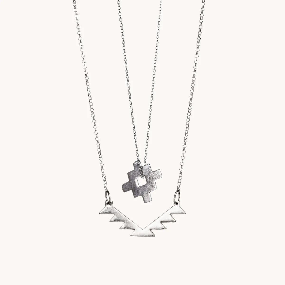 SkyWeaver: Sun and Thunderbird Pendant Set