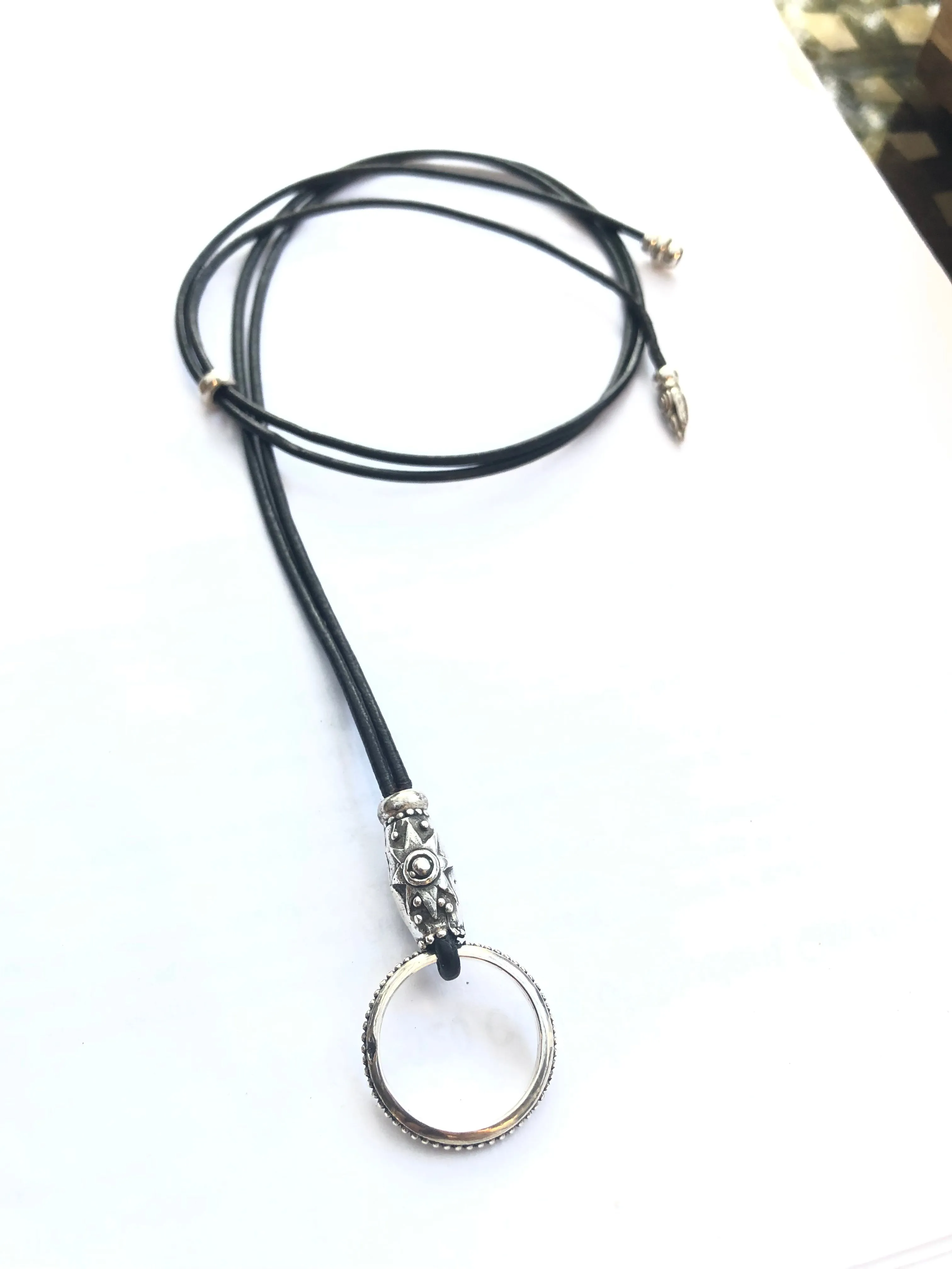 Star Light On Leather Eyering Necklace