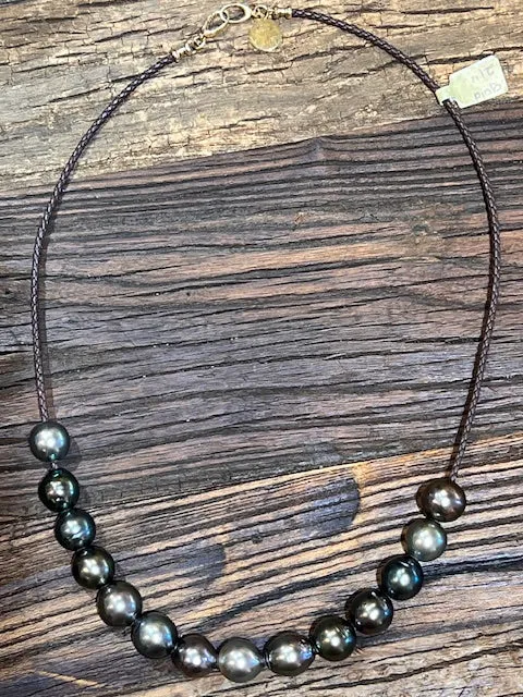 Tahitian pearls on braided dark brown leather 21''