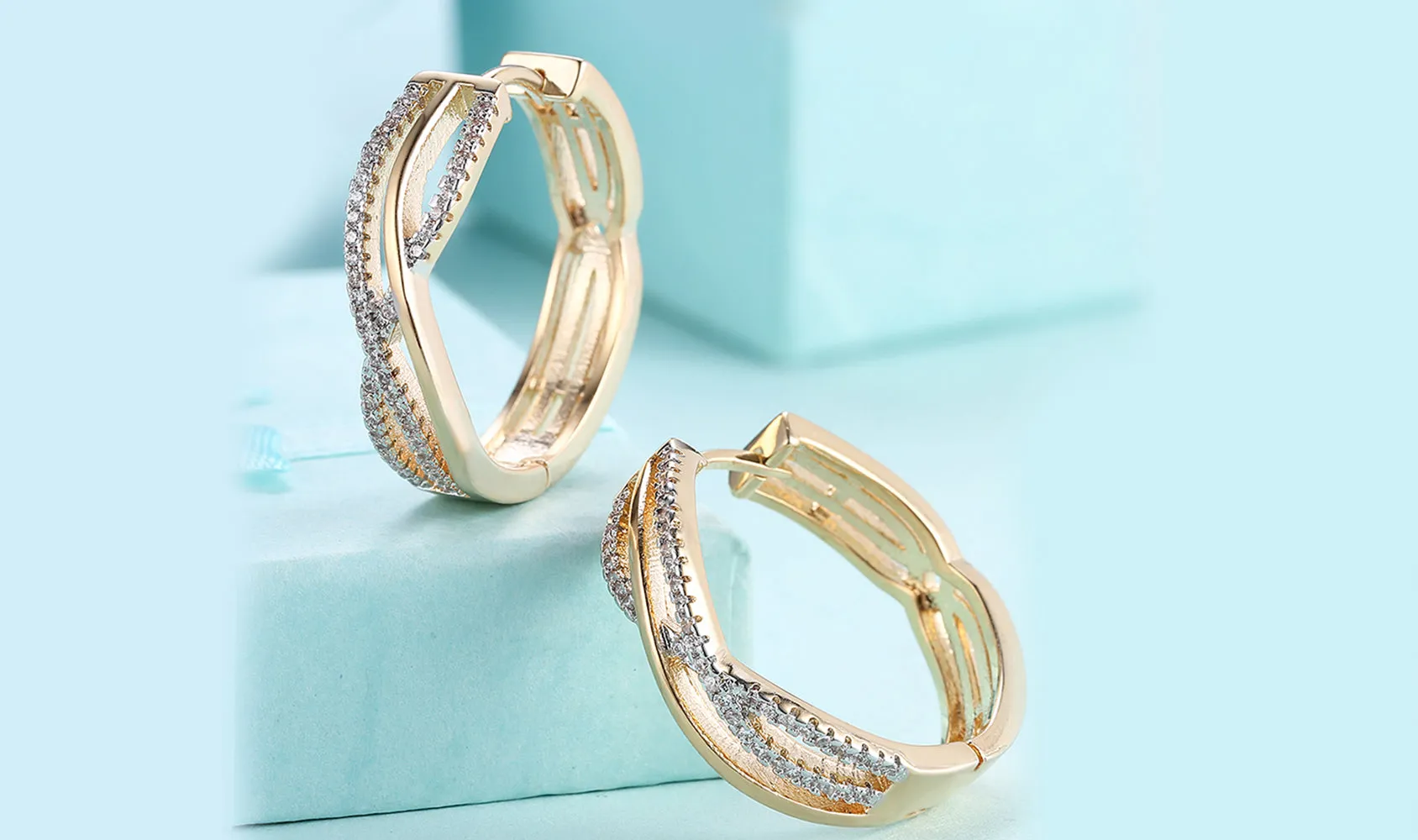 Twisted Abstract Clip-On Earrings with 14K Gold Plating and White Sapphire Stones