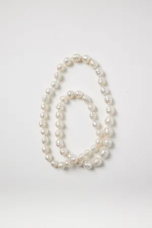 White Baroque Pearl Strand on Pink String