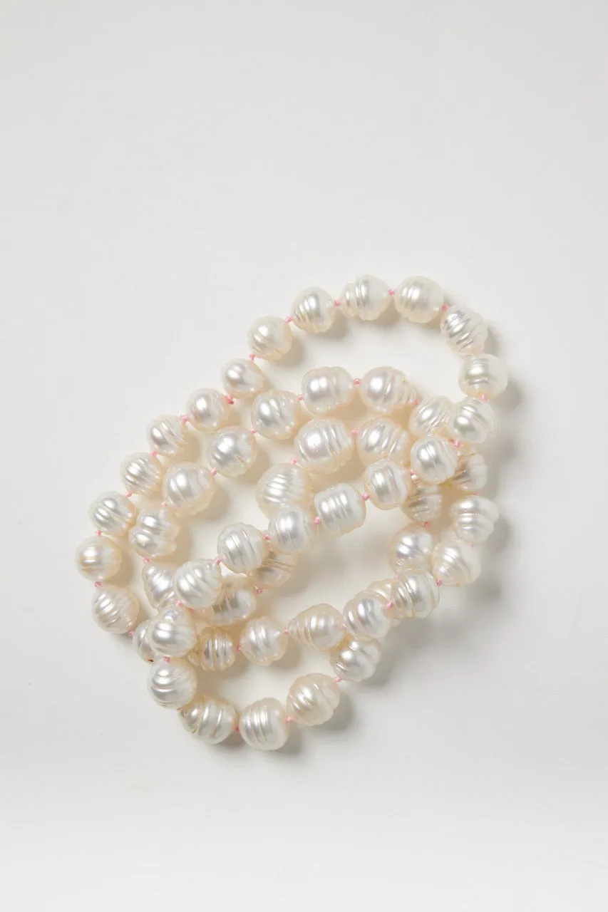 White Baroque Pearl Strand on Pink String