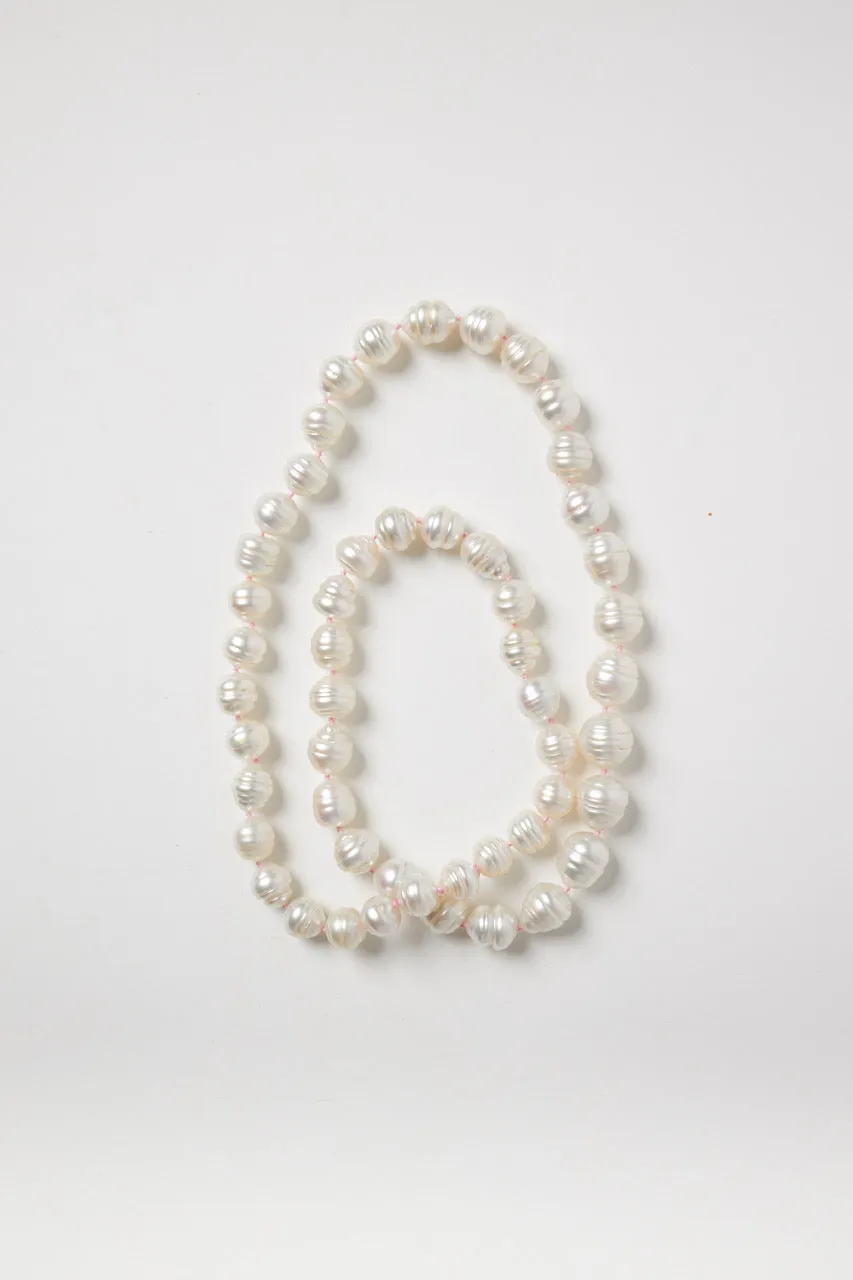 White Baroque Pearl Strand on Pink String